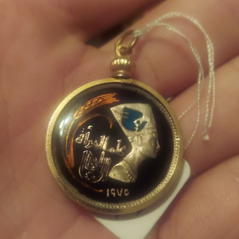 Egyptian Revival Vermeil Coin Pendant which features a Bust Of Nefertiti. 1975